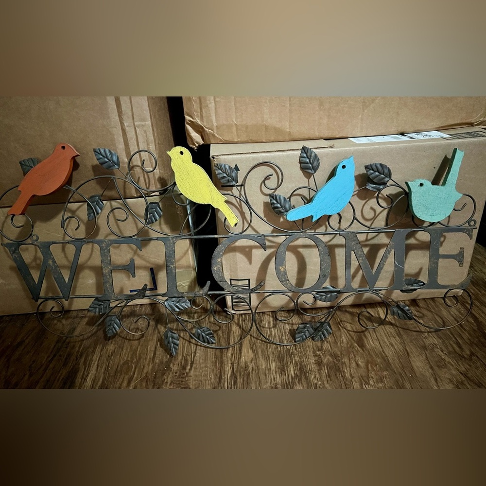 Iron rod “Welcome” art
